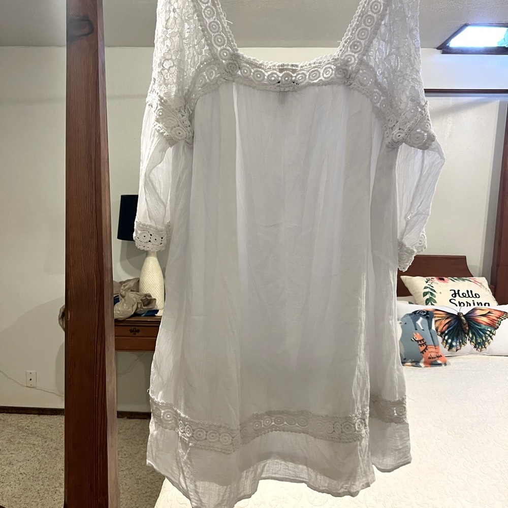 White cotton knee length dress with lace detailing